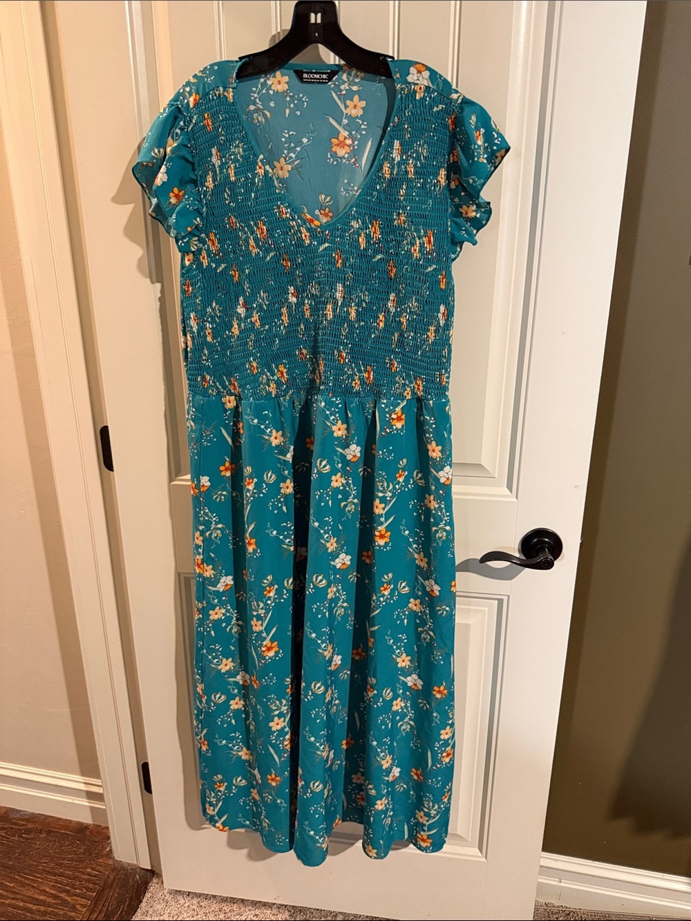 BloomChic Teal Floral Maxi Dress with Orange and White Accents